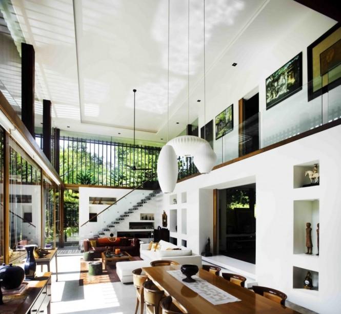 Dual level home design The owner of this home influenced much of the final look of the build, as their extensive collection of artwork and sculptures inspired the design of neat niches with chunky wall construction to house the precious art pieces.